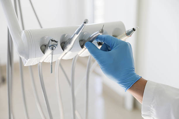 Professional Emergency Dentist technician working in Coronita, CA